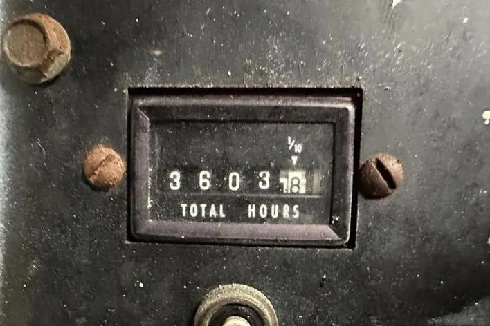 Slide: The Image of Hour meter showing 3603.8 hours on 1985 Egg Harbor 33 Sedan. - 49