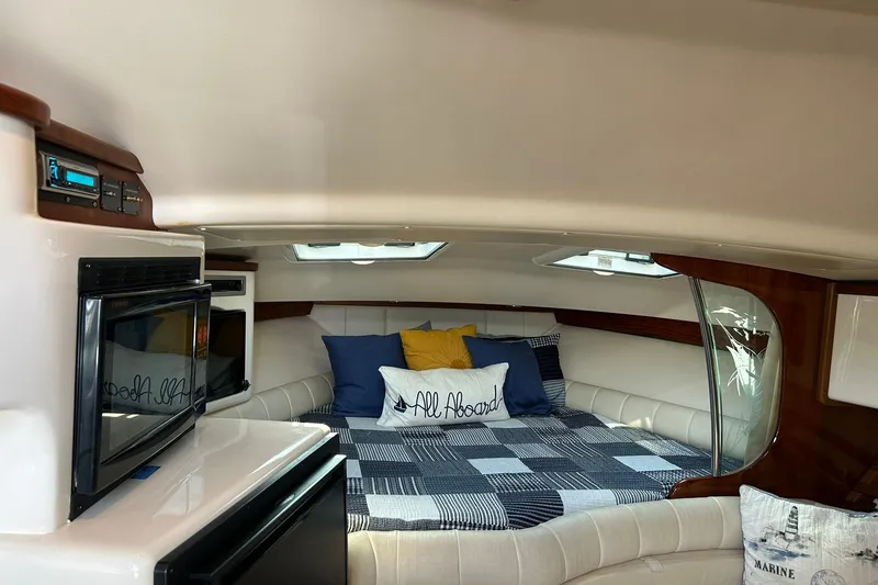 Slide: The Image of Interior of 2007 Grady-White Express 360 boat with cozy bed and modern amenities. - 21
