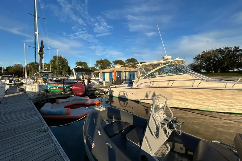 Slide: The Image of 2007 Grady-White Express 360 docked at marina under clear blue sky. - 37