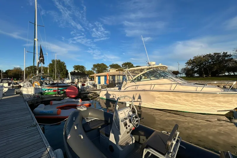 Slide: The Image of 2007 Grady-White Express 360 docked at marina under clear blue sky. - 42
