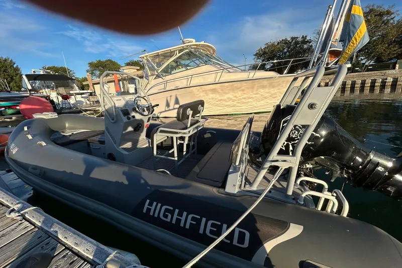 Slide: The Image of Highfield inflatable boat docked near 2007 Grady-White Express 360 yacht on a sunny day. - 47