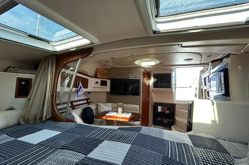 Slide: The Image of Interior of 2007 Grady-White Express 360 boat with skylights and cozy seating area. - 62