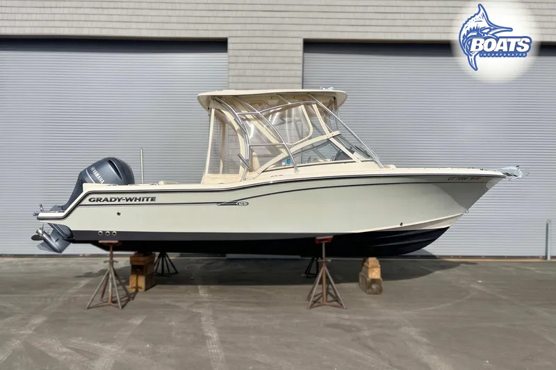 Slide: The Image of 2019 Grady-White Freedom 235 boat on display, featuring Yamaha outboard motor. - 1