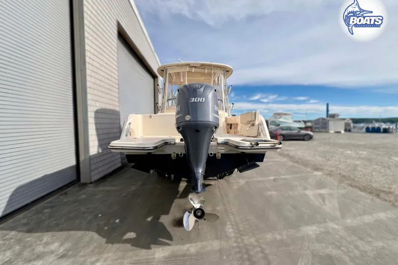 Slide: The Image of 2019 Grady-White Freedom 235 boat with Yamaha 300 engine, parked outdoors. - 15