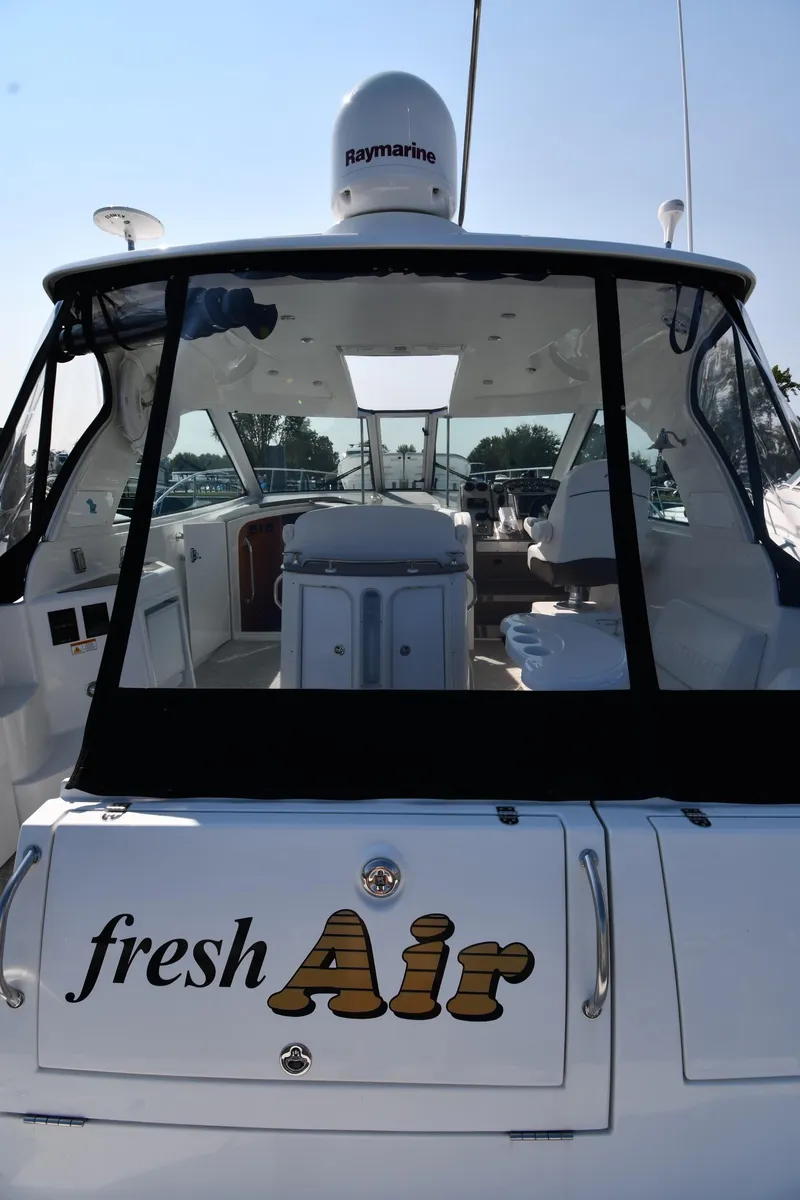 Slide: The Image of 2010 Cruisers Yachts 390 Sports Coupe, rear view with "fresh Air" text. - 10