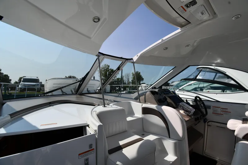Slide: The Image of 2010 Cruisers Yachts 390 Sports Coupe interior with sleek design and modern controls. - 11