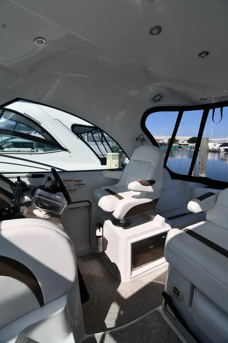 Slide: The Image of Interior of 2010 Cruisers Yachts 390 Sports Coupe with luxurious seating and modern design. - 18