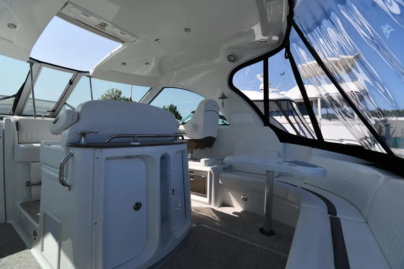 Slide: The Image of Interior of 2010 Cruisers Yachts 390 Sports Coupe, featuring sleek seating and modern design. - 20