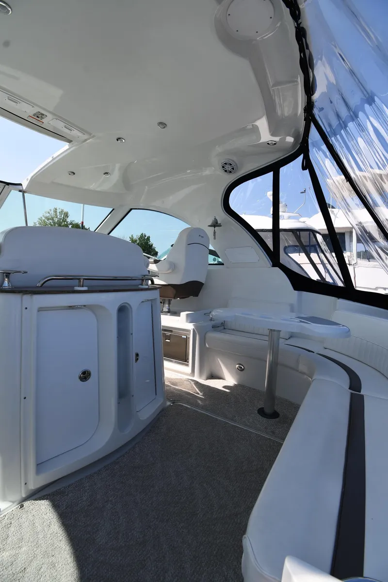 Slide: The Image of 2010 Cruisers Yachts 390 Sports Coupe interior with seating and cabinetry. - 21