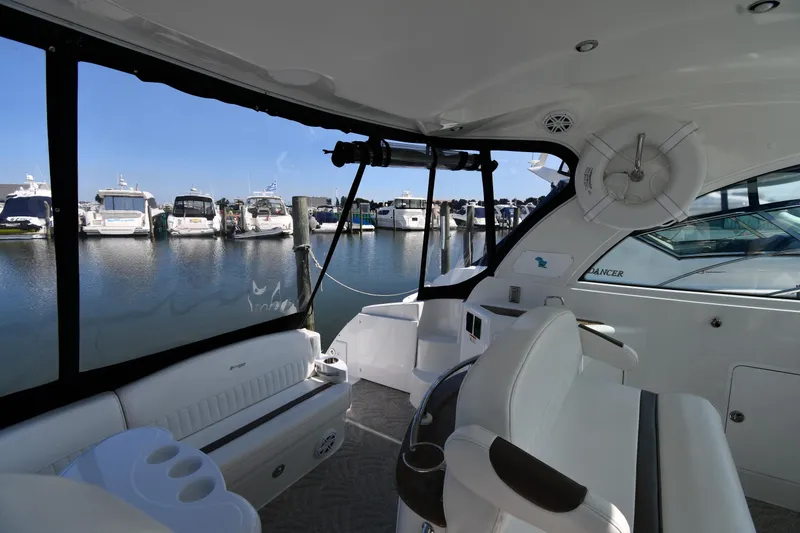 Slide: The Image of 2010 Cruisers Yachts 390 Sports Coupe interior with marina view. - 24