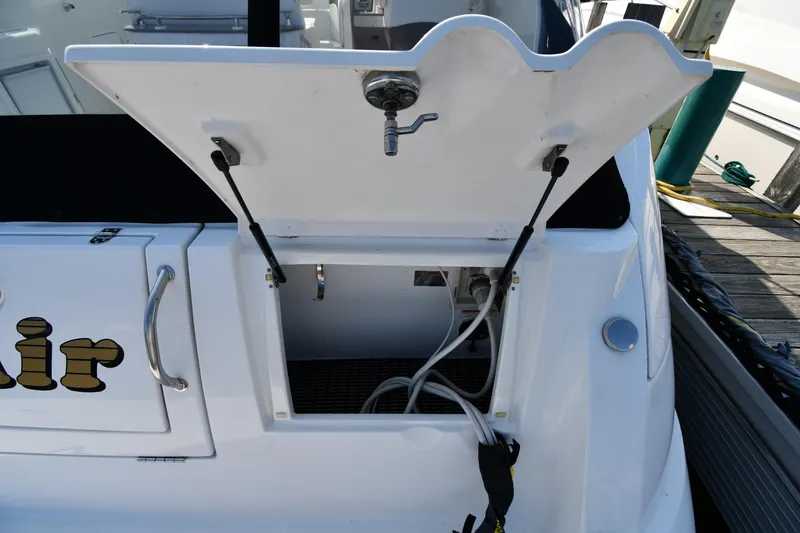 Slide: The Image of 2010 Cruisers Yachts 390 Sports Coupe, open storage compartment on deck. - 32