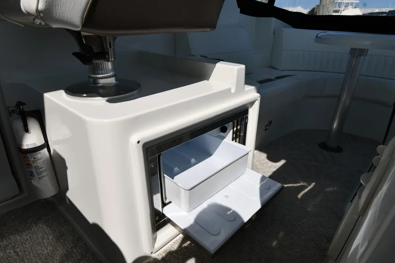 Slide: The Image of 2010 Cruisers Yachts 390 Sports Coupe interior with open storage compartment. - 33