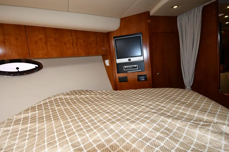 Slide: The Image of Interior cabin of 2010 Cruisers Yachts 390 Sports Coupe with TV and bed. - 41
