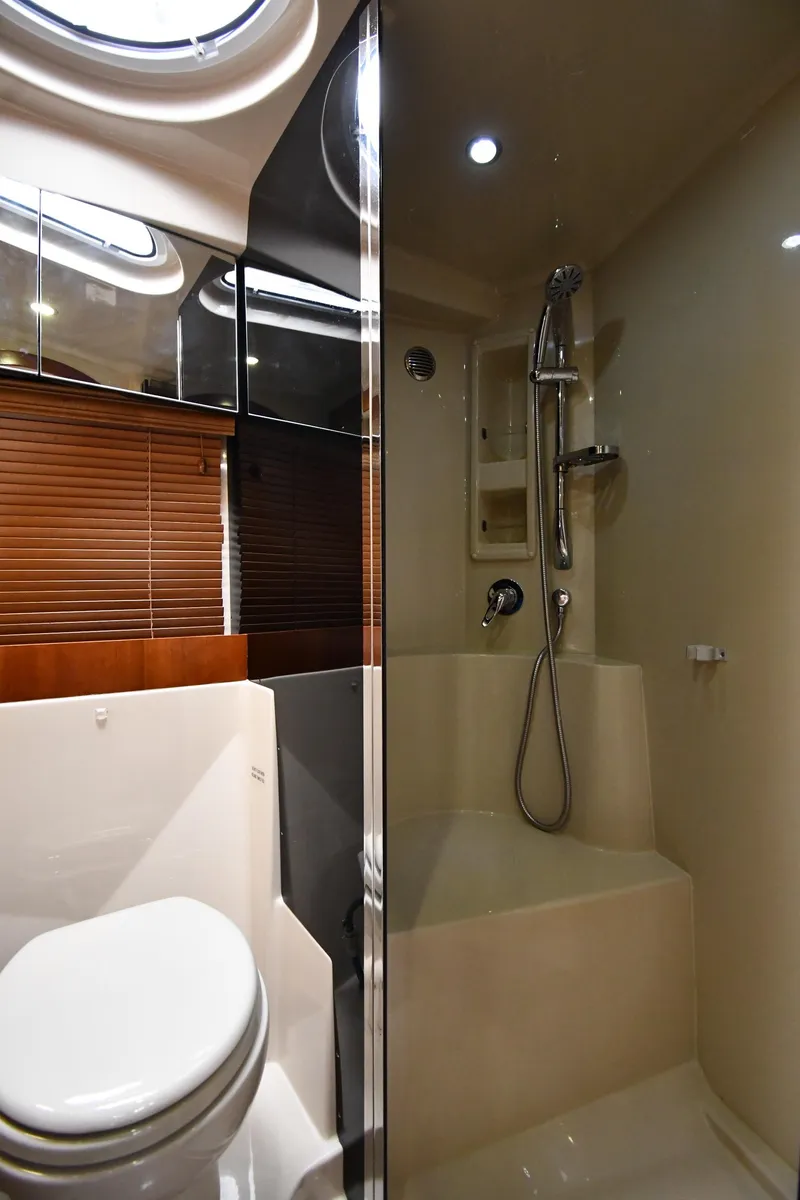 Slide: The Image of 2010 Cruisers Yachts 390 Sports Coupe bathroom with modern shower and toilet. - 44