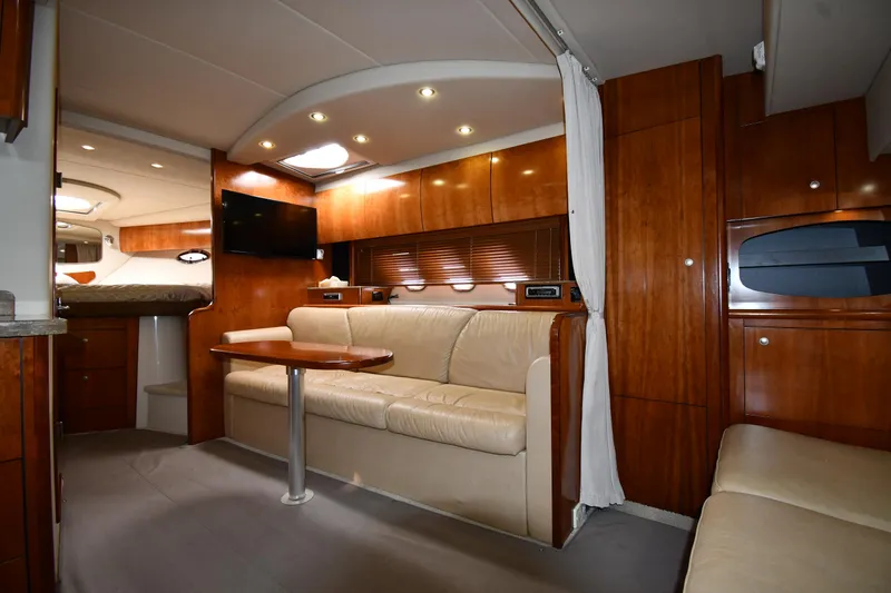 Slide: The Image of Luxurious interior of 2010 Cruisers Yachts 390 Sports Coupe with elegant wood finish. - 45