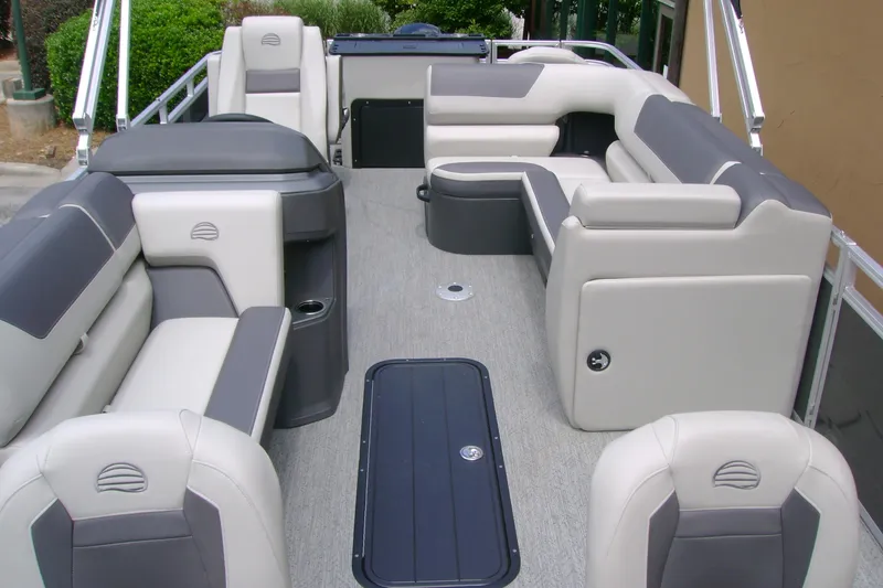 Slide: The Image of 2026 Sun Tracker Fishin' Barge 22 XP3 interior with spacious seating and modern design. - 5