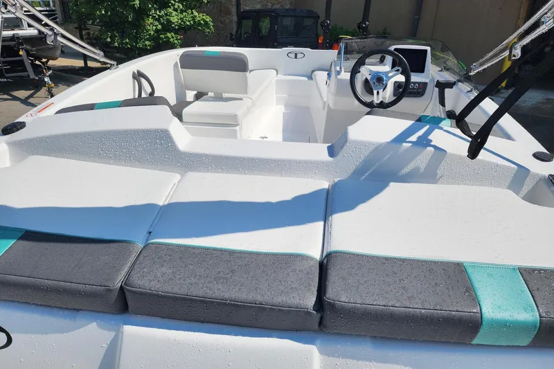 Slide: The Image of 2026 Tahoe T16 boat interior with modern seating and steering wheel. - 3