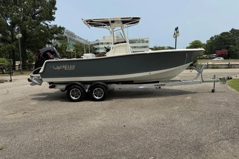 Slide: The Image of 2026 Mako 214 Center Console boat on trailer in parking lot. - 6