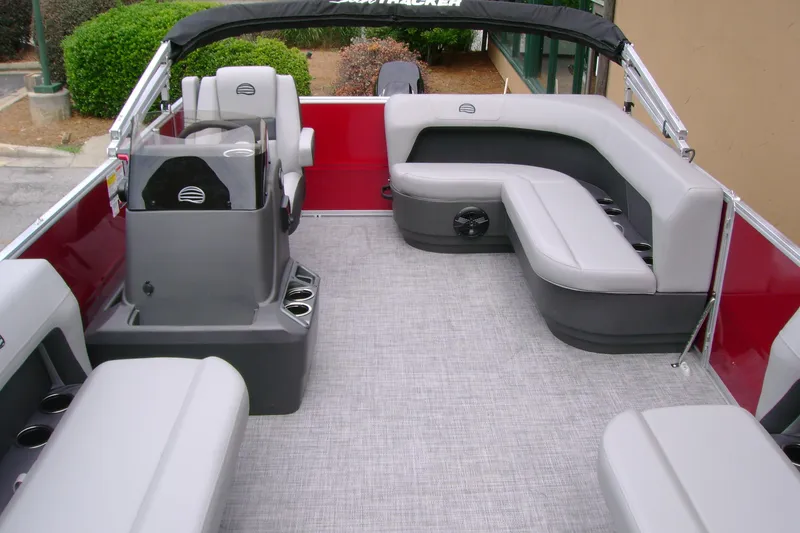 Slide: The Image of 2026 Sun Tracker Party Barge 16 DLX interior with spacious seating and modern design. - 5