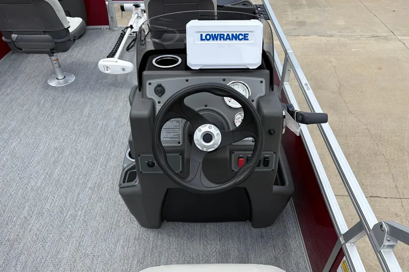 Slide: The Image of 2026 Sun Tracker Bass Buggy 18 DLX steering console with Lowrance Elite fish finder. - 6