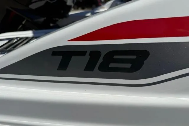 Slide: The Image of 2026 Tahoe T18 boat logo with sleek design and red accent. - 9