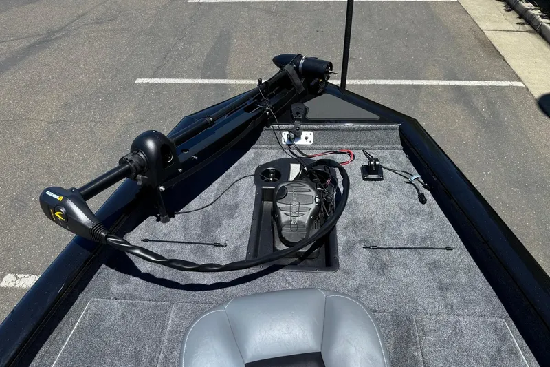 Slide: The Image of 2026 Tracker Pro Team 190 boat deck with trolling motor and control panel. - 10