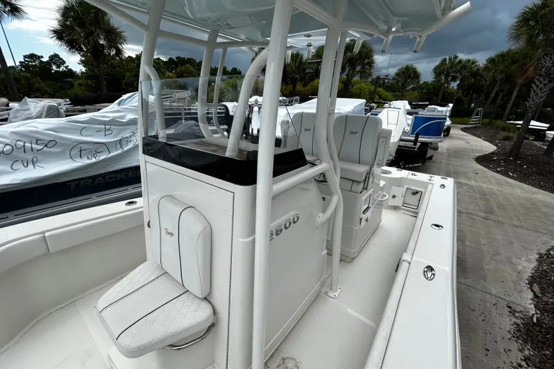 Slide: The Image of 2025 Ranger 2600 Bay boat with sleek white interior and modern design. - 7