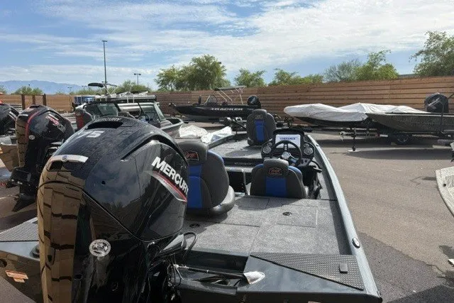 Slide: The Image of 2026 Ranger RT178 boat with Mercury engine in outdoor showroom. - 3
