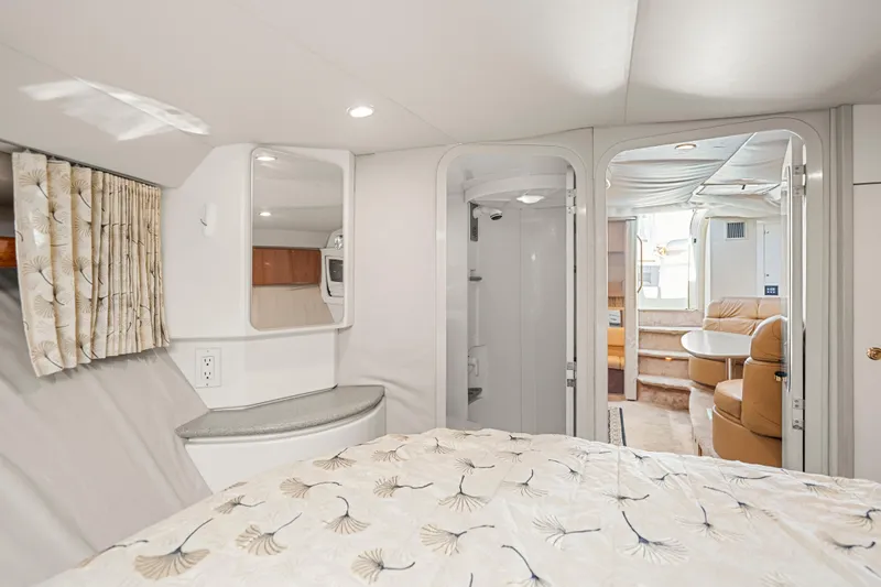 Slide: The Image of Interior of 2000 Formula 41 Performance Cruiser with cozy seating and elegant decor. - 27