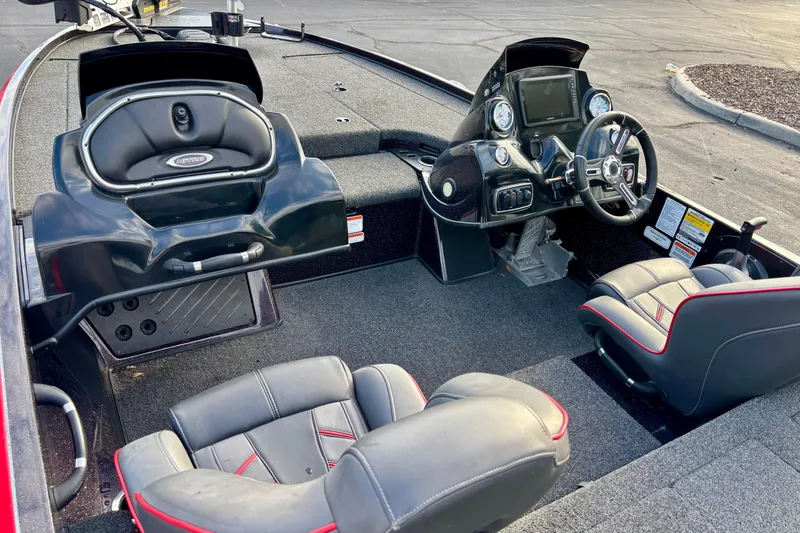 Slide: The Image of Interior of a 2018 Nitro Z18 boat with steering console and seating. - 5