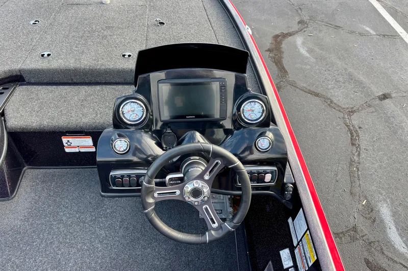 Slide: The Image of Steering console of a 2018 Nitro Z18 boat with gauges and Garmin display. - 6