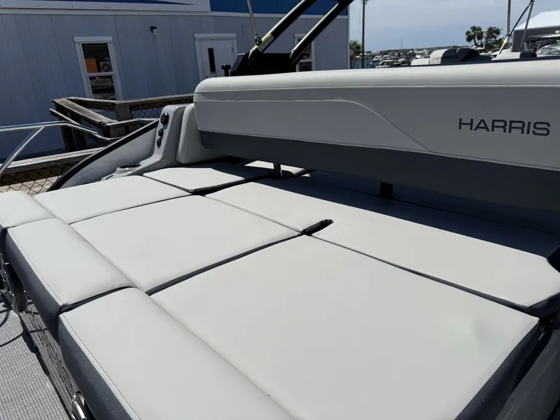 Slide: The Image of The image shows the sun pad of a 2027 Harris Grand Mariner 250. - 47