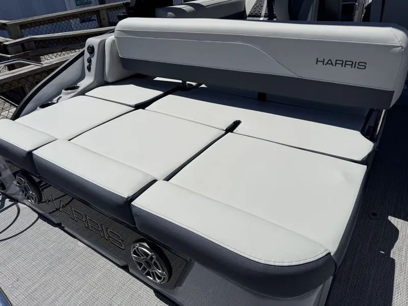 Slide: The Image of The image shows a lounging area on a 2027 Harris Grand Mariner 250 boat. - 46