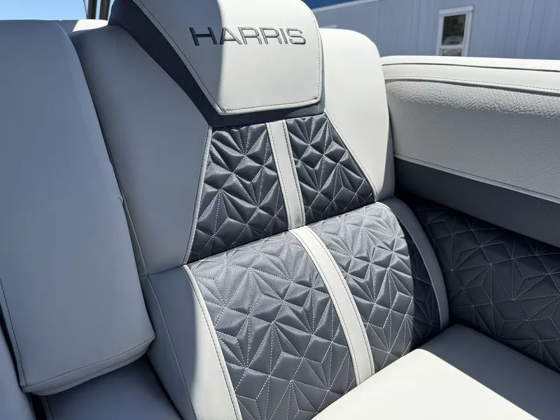 Slide: The Image of Luxurious gray upholstery with Harris logo on a boat seat, featuring stylish geometric design. - 24