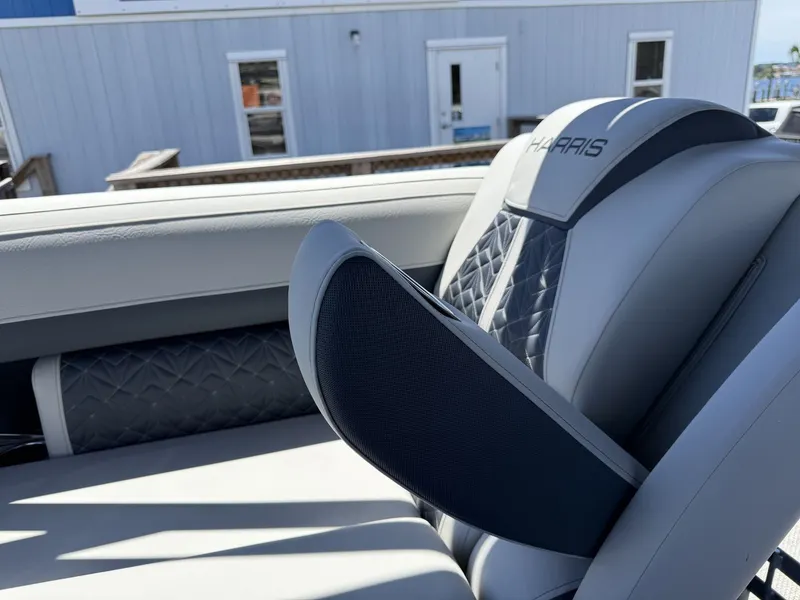 Slide: The Image of Close-up of a luxurious boat seat with quilted pattern and Harris logo. - 43