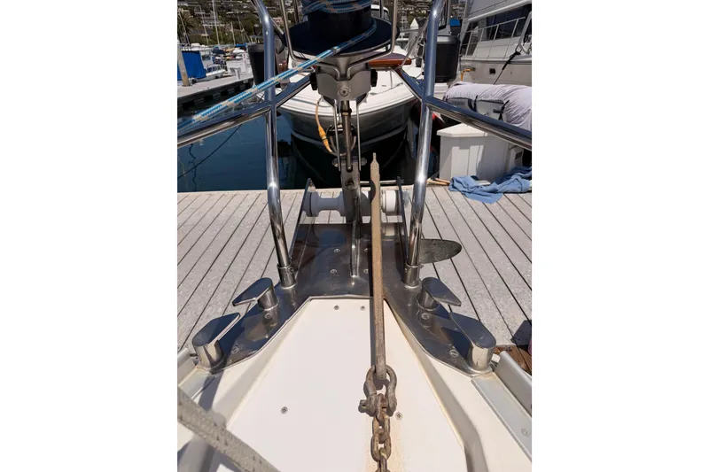 Slide: The Image of Bow view of 1999 Jeanneau Sun Odyssey 45.2 yacht at dock. - 17