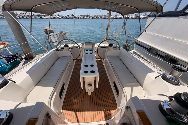 Slide: The Image of Cockpit of 1999 Jeanneau Sun Odyssey 45.2 sailboat with dual steering wheels. - 23