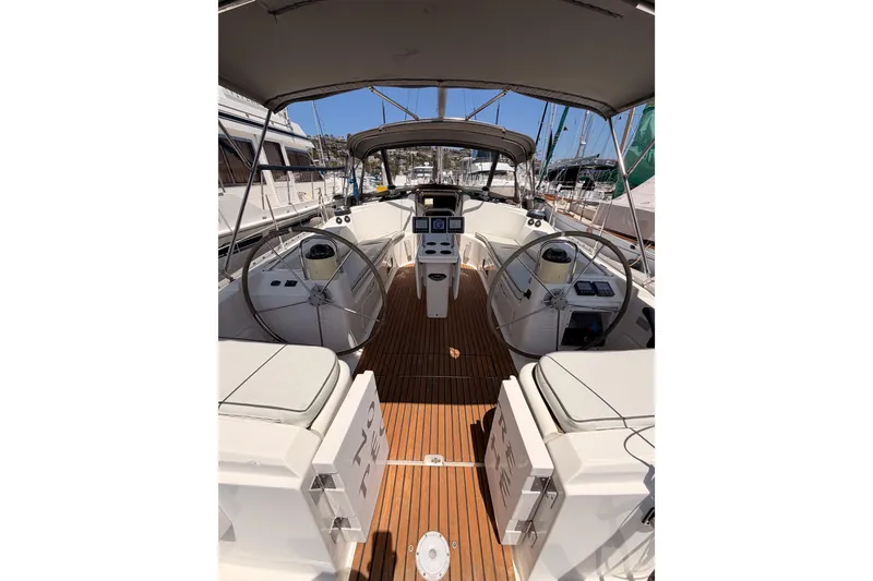 Slide: The Image of Cockpit view of 1999 Jeanneau Sun Odyssey 45.2 sailboat with dual steering wheels. - 27
