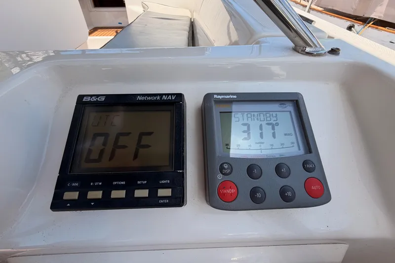 Slide: The Image of Navigation instruments on a 1999 Jeanneau Sun Odyssey 45.2 yacht dashboard. - 31