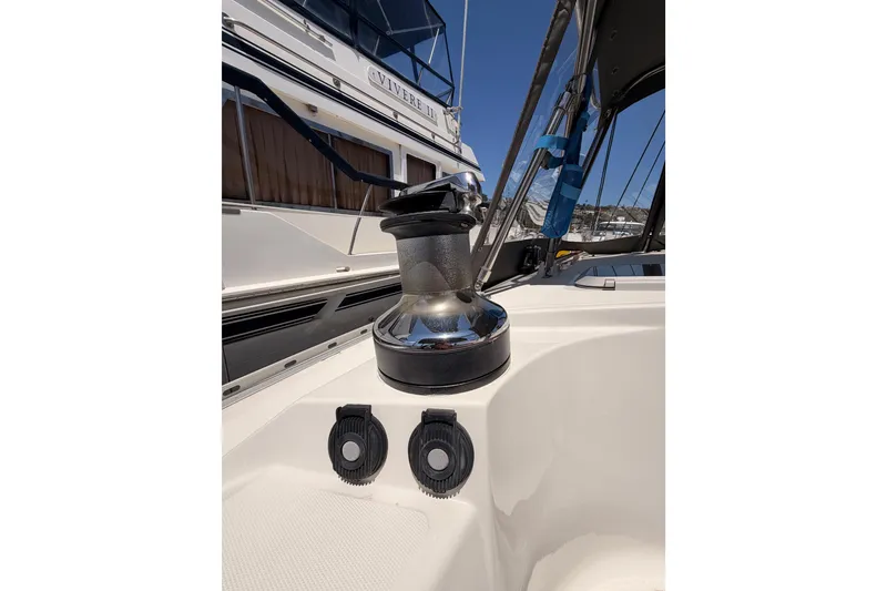 Slide: The Image of Jeanneau Sun Odyssey 45.2 sailboat deck detail, featuring winch and rigging, 1999 model. - 34
