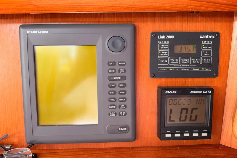 Slide: The Image of Navigation and control panel on a 1999 Jeanneau Sun Odyssey 45.2 sailboat. - 42