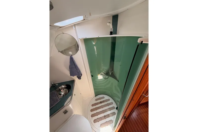 Slide: The Image of Bathroom interior of 1999 Jeanneau Sun Odyssey 45.2 yacht with shower and sink. - 70