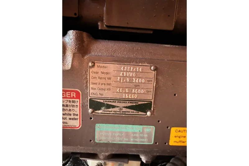 Slide: The Image of Close-up of Yanmar diesel engine plate on 1999 Jeanneau Sun Odyssey 45.2 sailboat. - 81