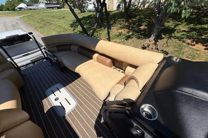 Slide: The Image of Luxurious seating on 2023 Premier 270 Intrigue RF boat with elegant interior design. - 9