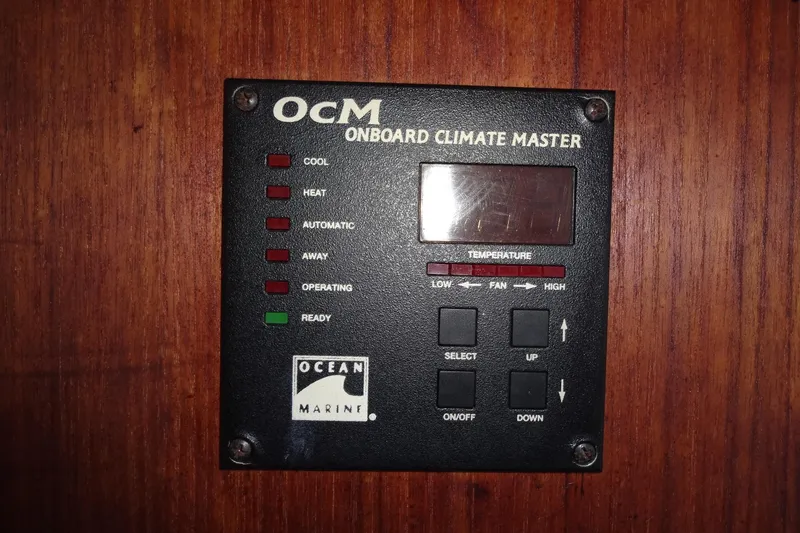 Slide: The Image of OCM Onboard Climate Master control panel on 1996 Lagoon 35 CCC yacht interior. - 101