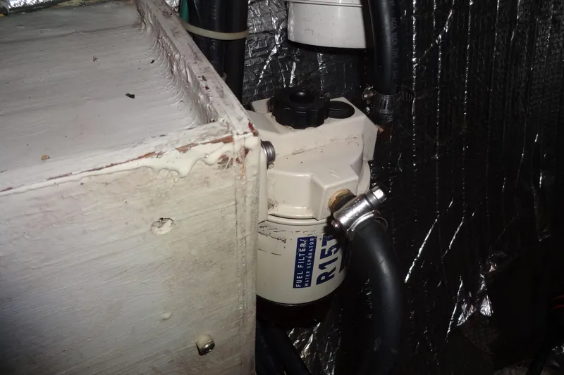 Slide: The Image of Fuel filter system in a 1996 Lagoon 35 CCC boat engine compartment. - 108