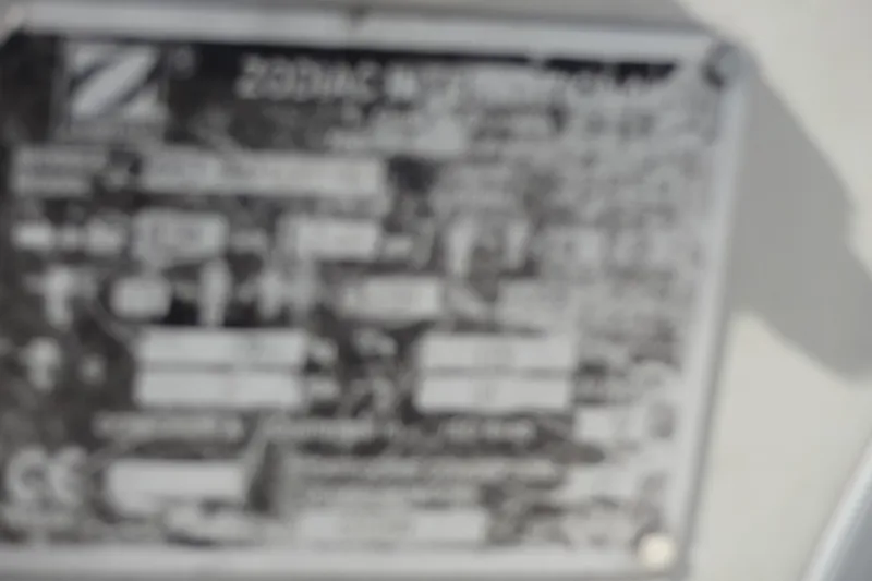Slide: The Image of Blurred identification plate on a 1996 Lagoon 35 CCC boat. - 30