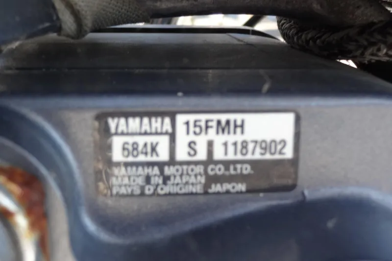 Slide: The Image of Yamaha 15FMH engine label on 1996 Lagoon 35 CCC boat, showing serial number. - 33