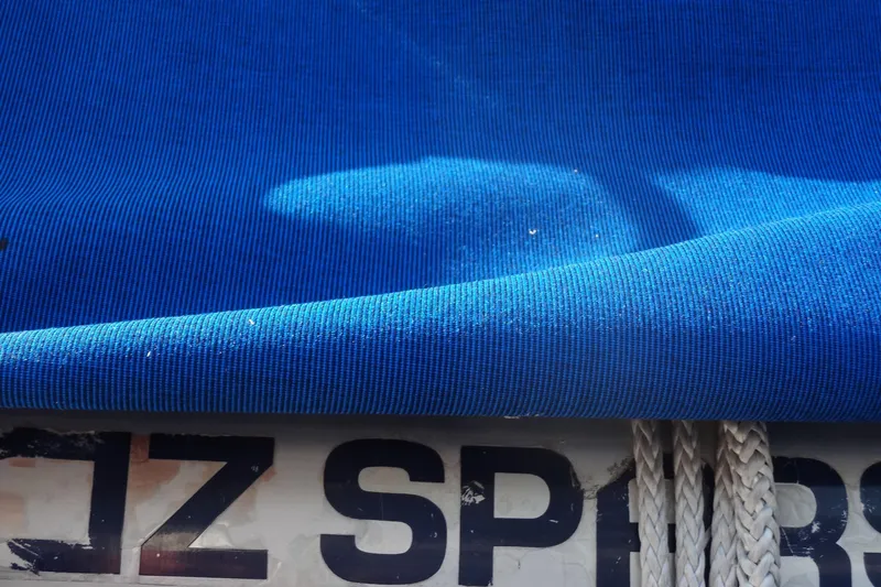 Slide: The Image of Blue fabric and ropes on a 1996 Lagoon 35 CCC boat. - 34
