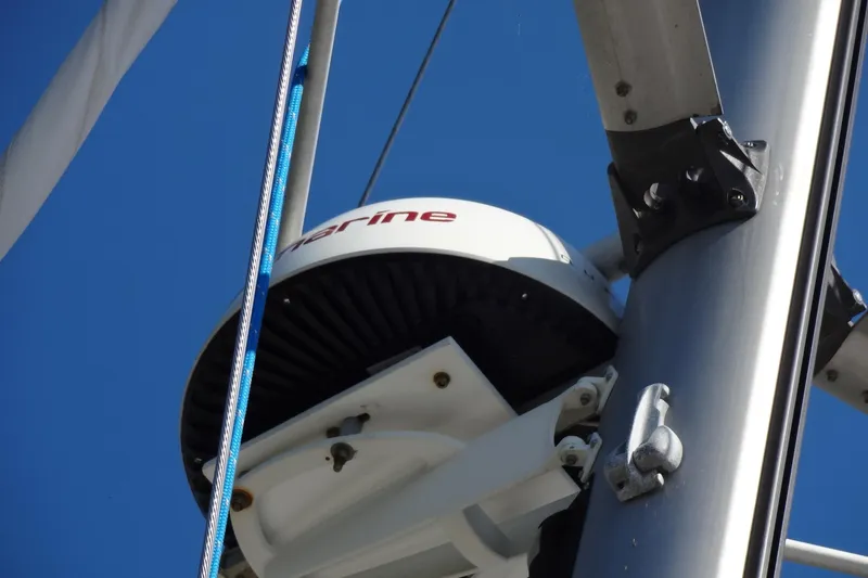 Slide: The Image of Radar equipment on a 1996 Lagoon 35 CCC sailboat mast against a clear blue sky. - 44